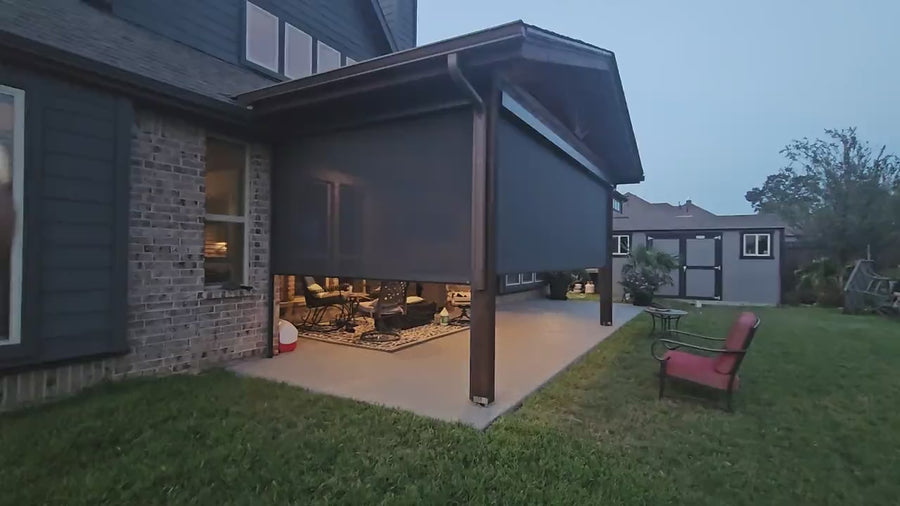 Grey-framed outdoor solar screen with 3% fabric.